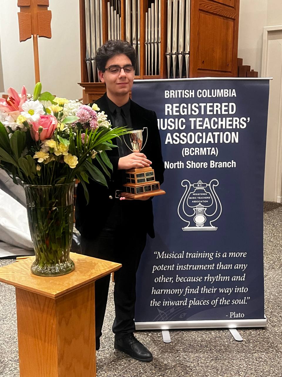Mahan with BCRMTA banner and trophy